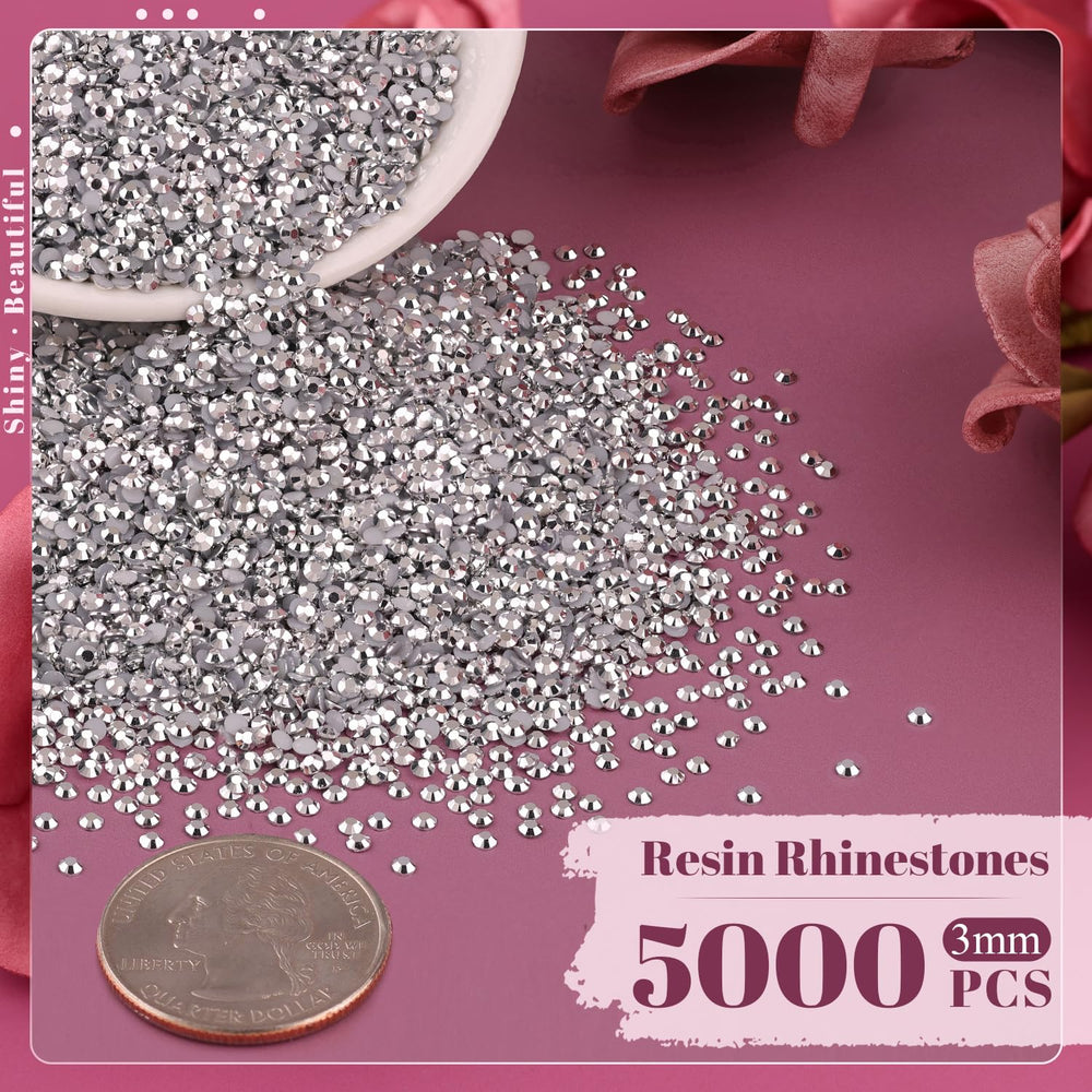 BELLEBOOST pickup pen and tweezers in-use shot for precise jewel placement.