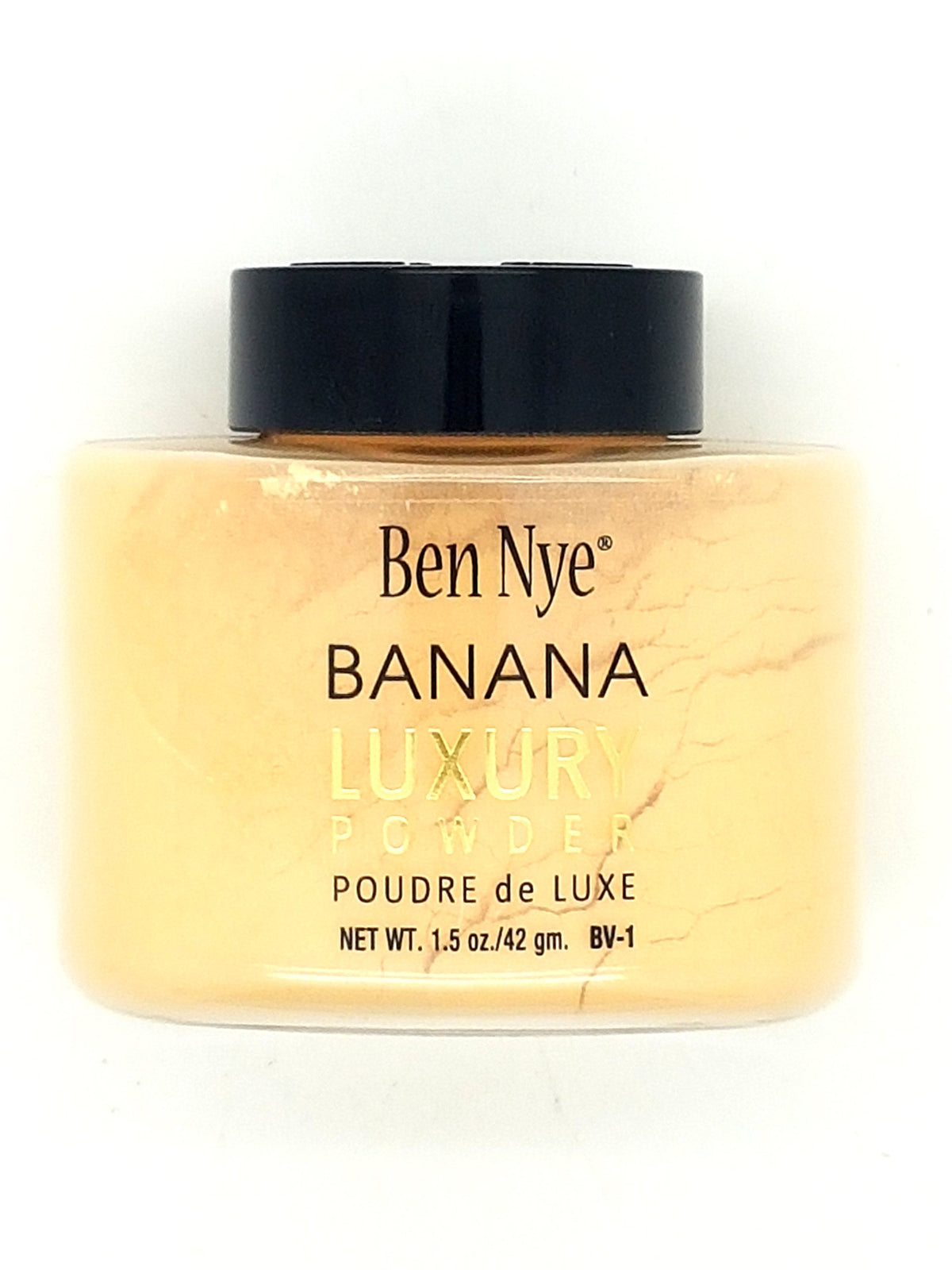 Ben Nye Luxury Powders Banana 1.5oz packaging closeup highlighting silky texture and shine control