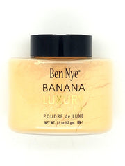 Ben Nye Luxury Powders Banana 1.5oz packaging closeup highlighting silky texture and shine control