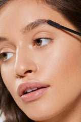 Benefit 24-hr Brow Setter layering over pencil for natural-looking brows