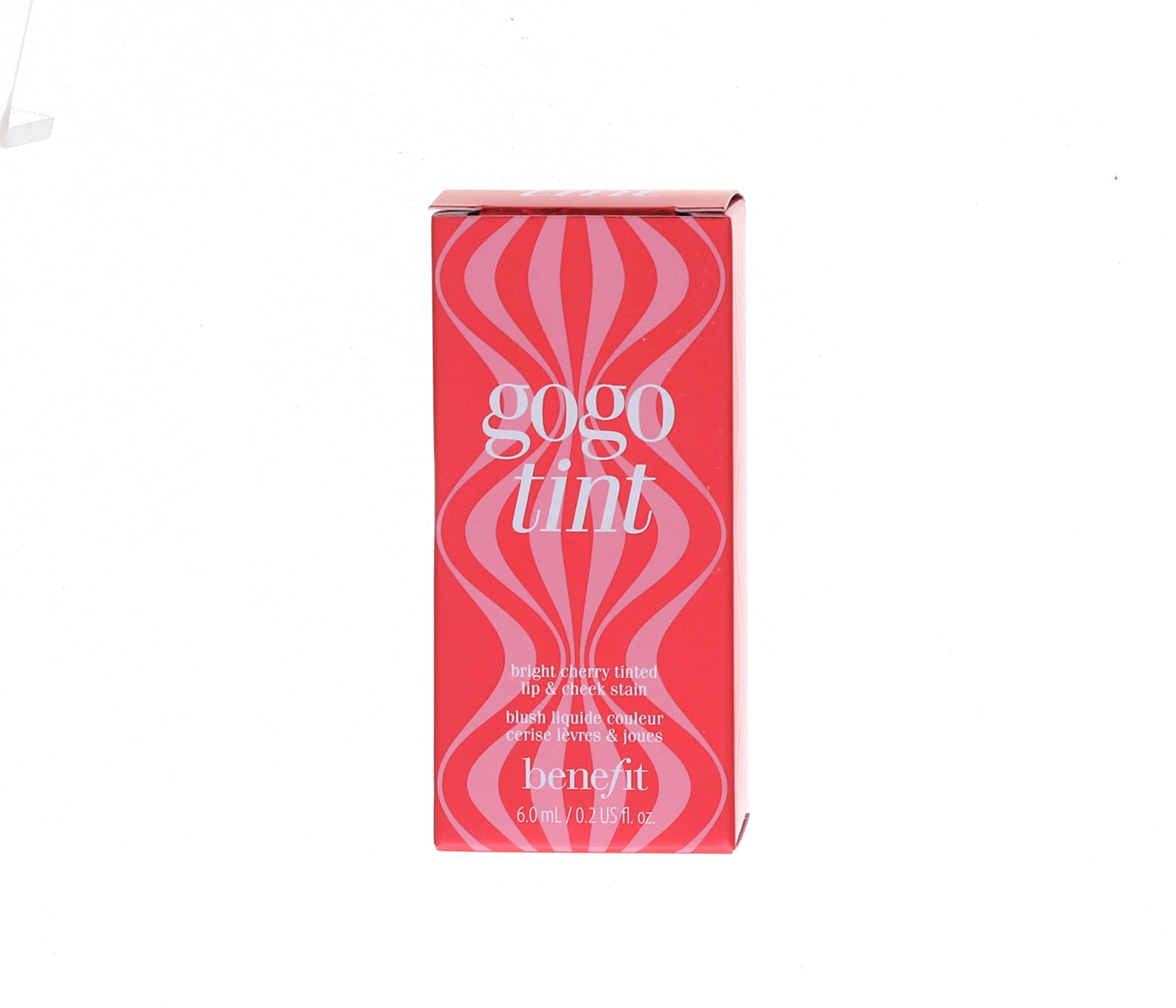 Benefit Gogo Tint on lips application demonstrates bold cherry shade.
