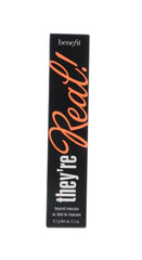 Benefit They're Real Mascara wand applying coat for defined volume.