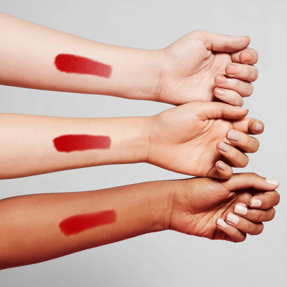 Benefit Benetint cheek swatch reveals sheer rose tint for versatility.