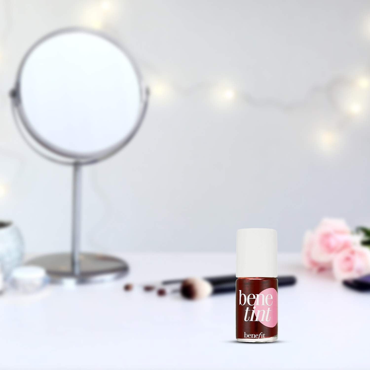 Benefit Benetint travel-size packaging demonstrates unboxed, portable design.