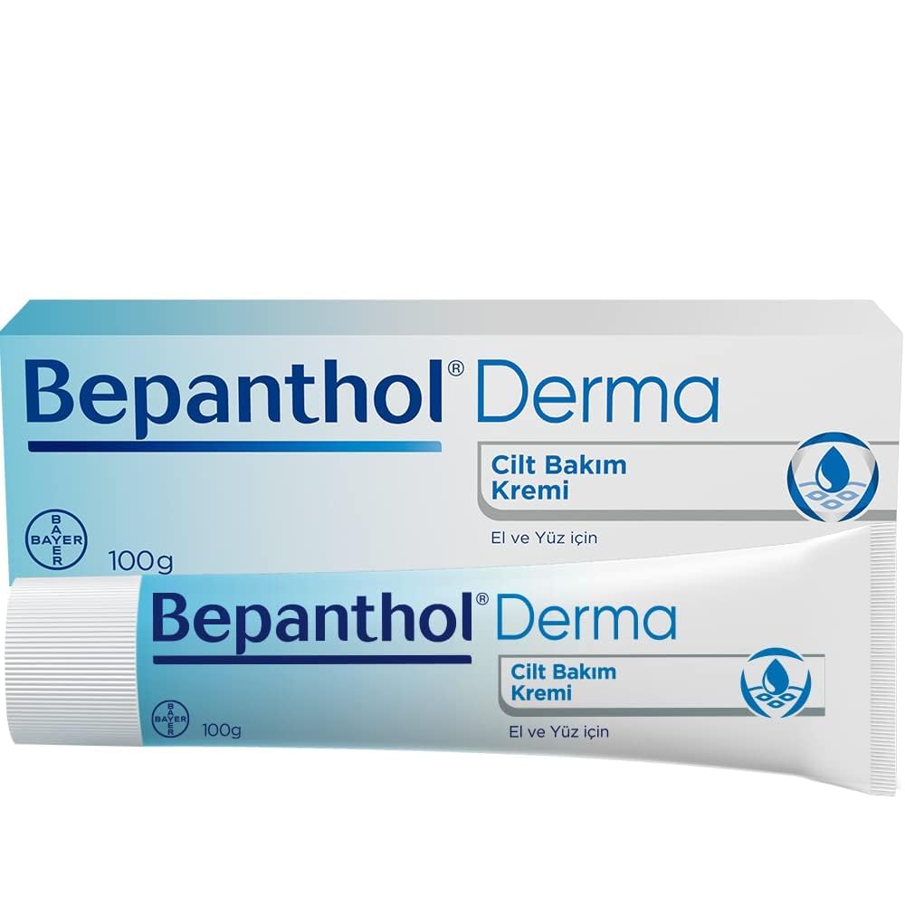 Bepanthol cream jar closeup shows fast-absorbing hydration for dry skin.