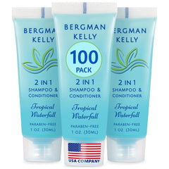 BERGMAN KELLY 2in1 travel-size bottle with tropical waterfall scent, foil-sealed for mess-free hotel use.