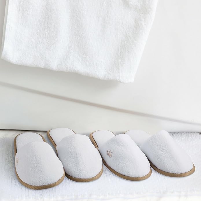 BERGMAN KELLY spa slippers gray flecked trim suited for lounge and hotel ambiance.
