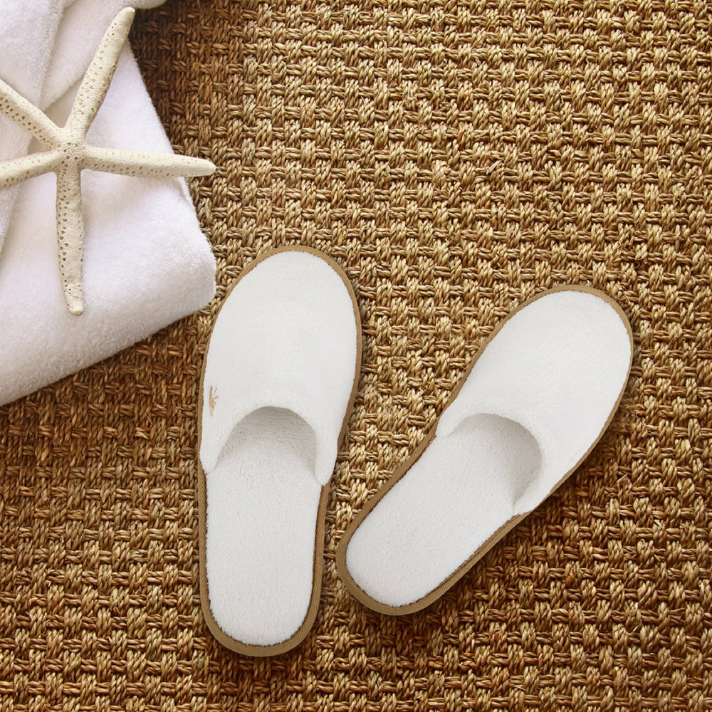 BERGMAN KELLY spa slippers travel-friendly for Airbnb and on-the-go comfort.