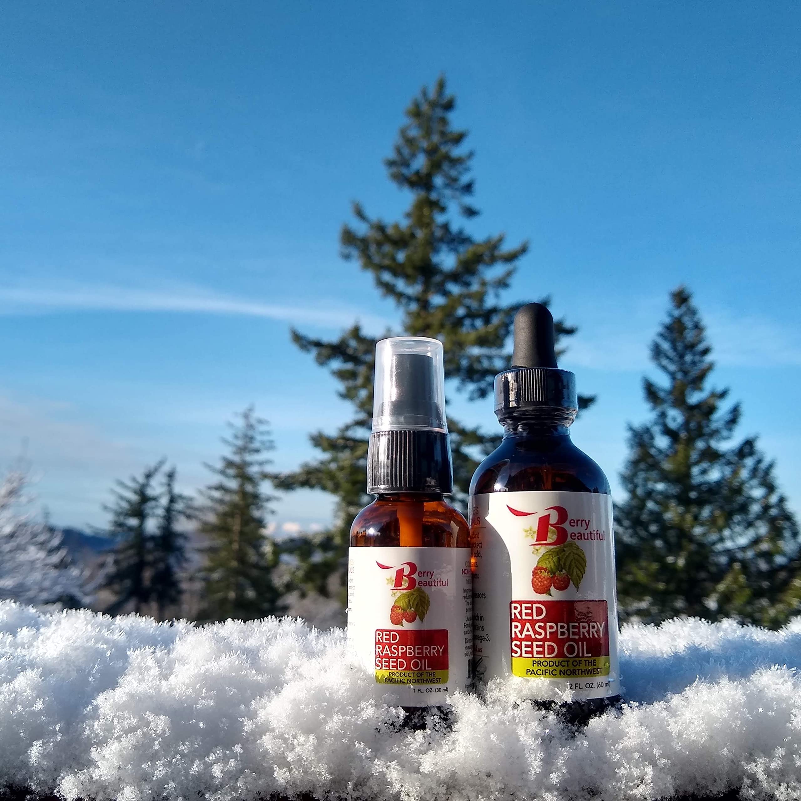 Berry Beautiful Raspberry Seed Oil amber flask captures premium unrefined color and aroma.