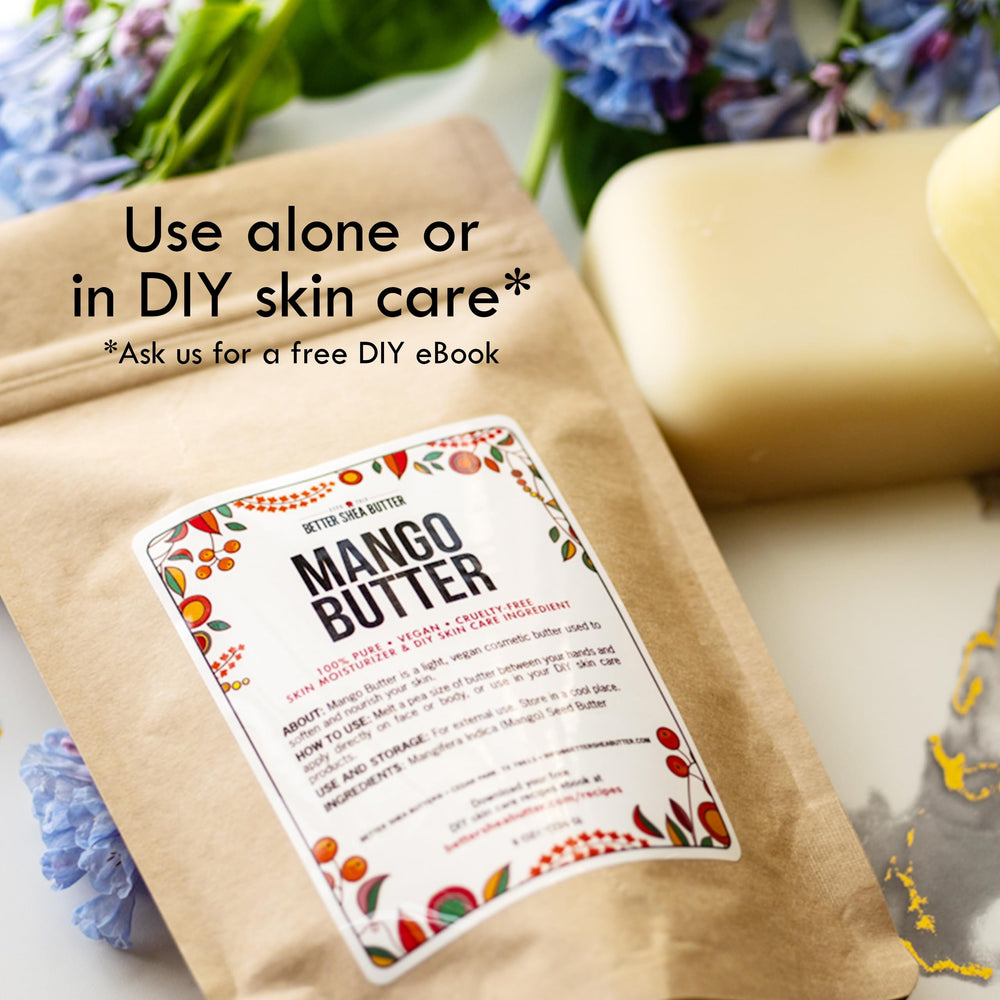 Better Shea Butter Mango Butter creamy texture ready for facial application.