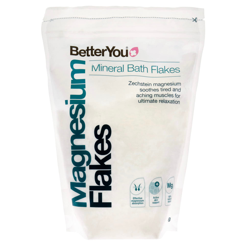BetterYou magnesium flakes close-up highlighting crystalline texture for muscle relief and relaxation.