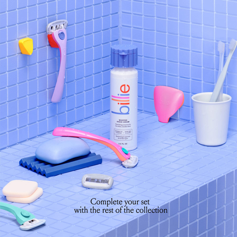 Billie refills on bathroom shelf with shave cream for a complete routine