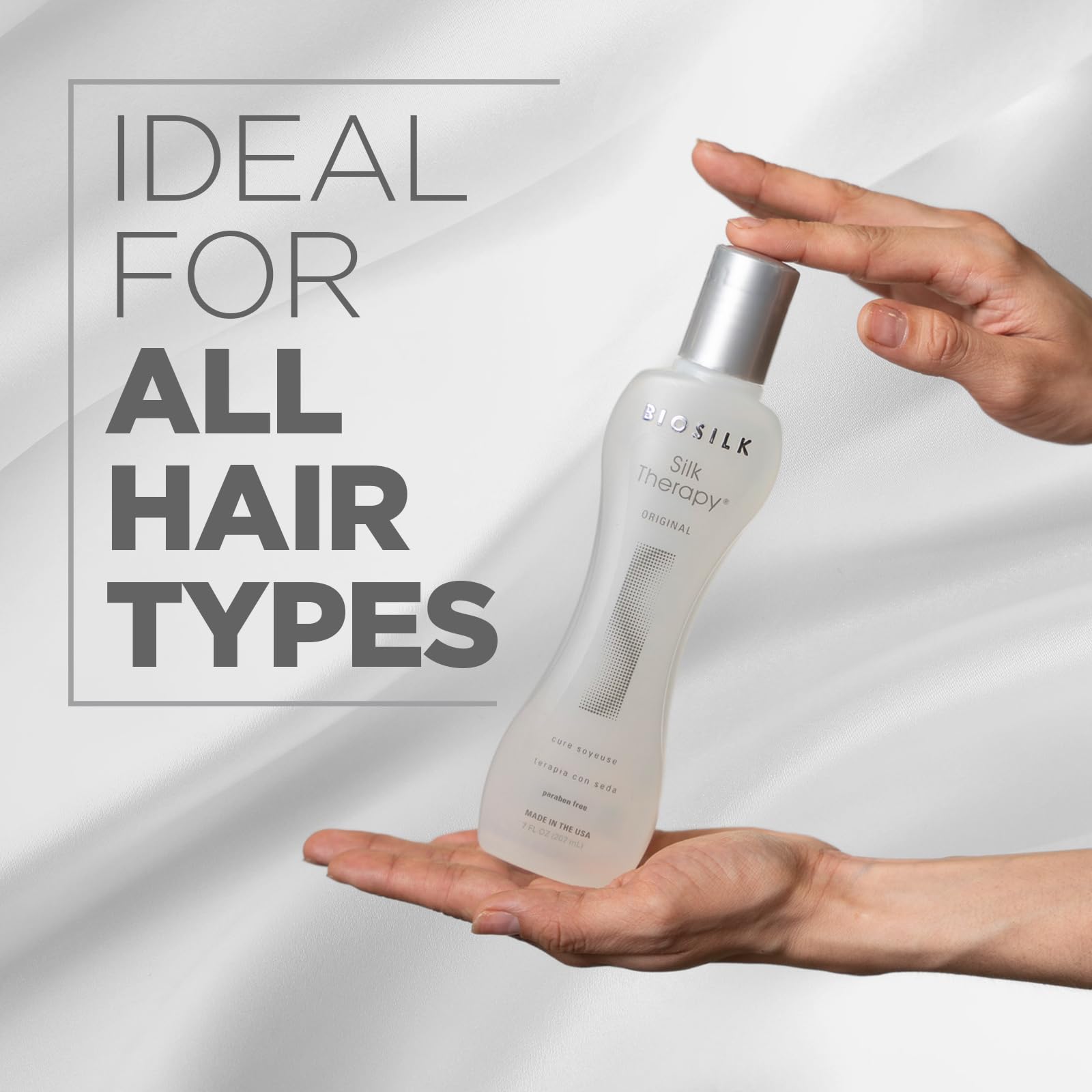 BioSilk Silk Therapy Original hands applying product for weightless leave-in care