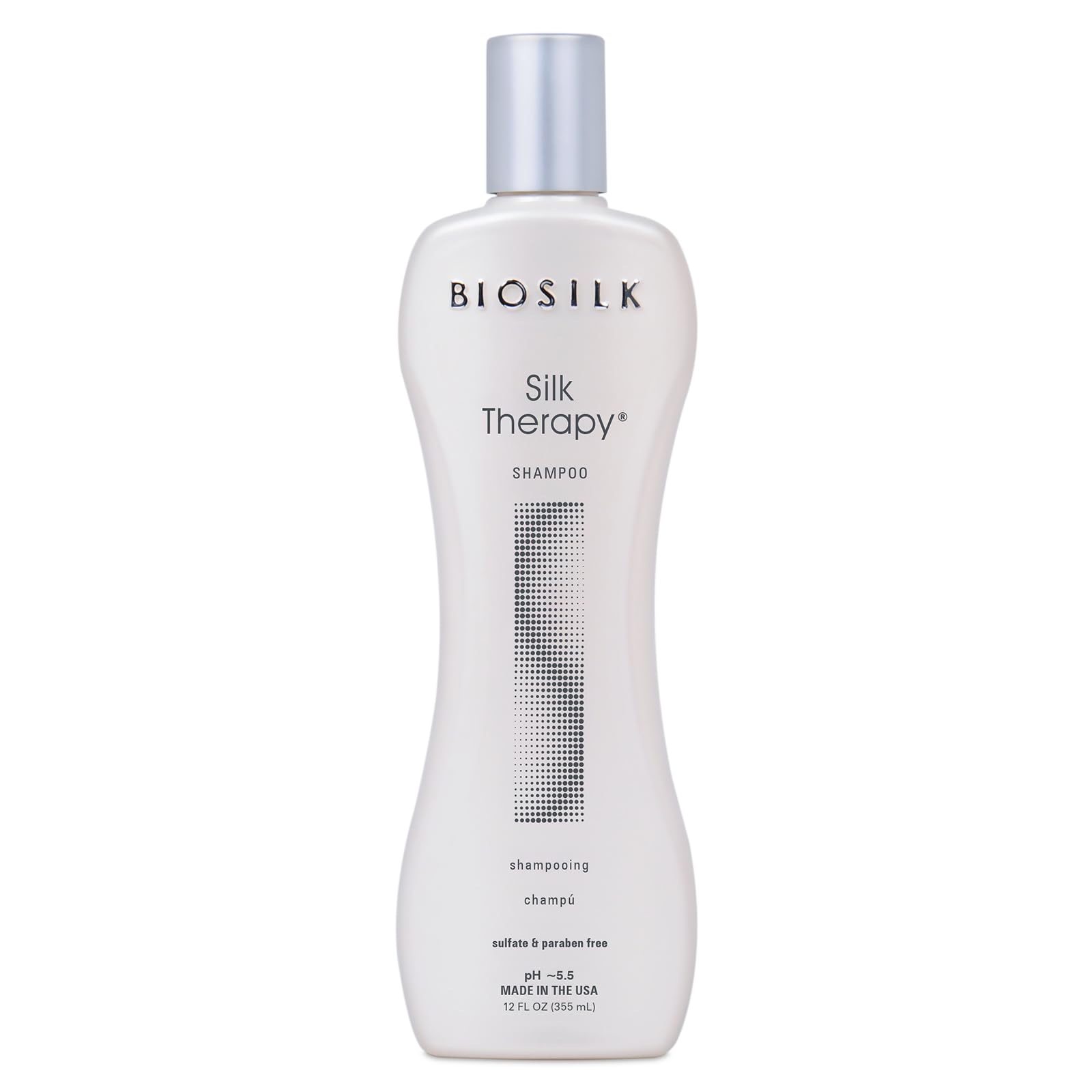 BioSilk Silk Therapy Shampoo bottle shows shiny, manageable hair result.