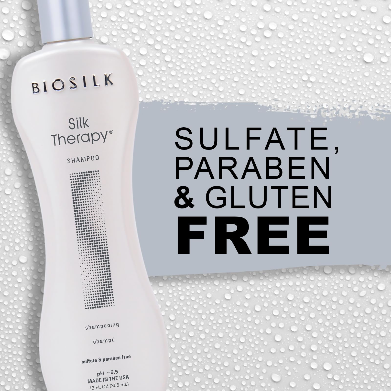BioSilk Silk Therapy Shampoo being massaged into scalp for gentle cleansing.