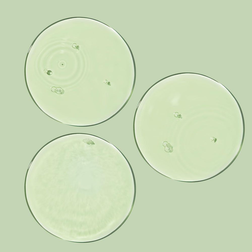 BIOSSANCE Squalane + BHA Toner application pad demonstrates gentle exfoliation.