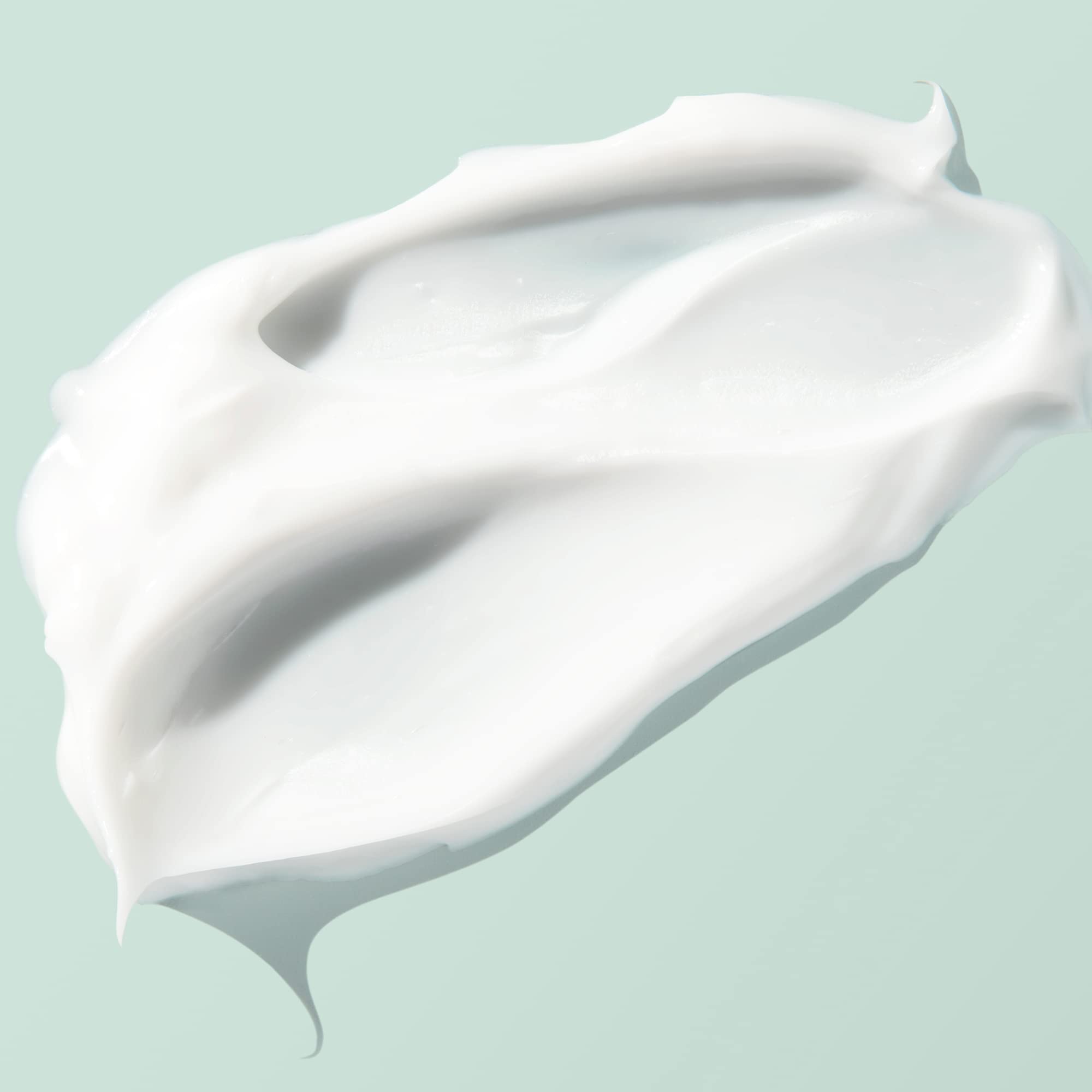 BIOSSANCE Squalane + Omega Repair Cream on hand ready for daily application