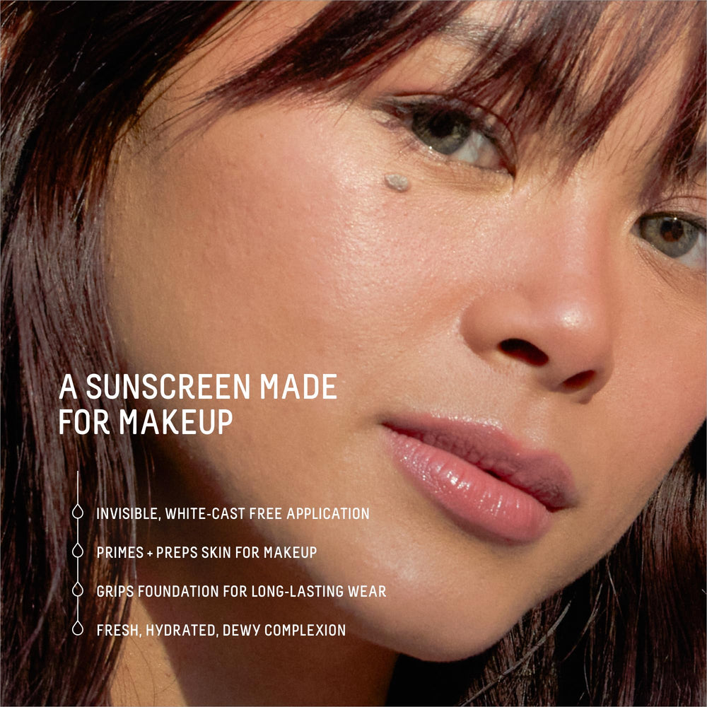 Biossance travel-size sunscreen tube fits into bags for daily protection.