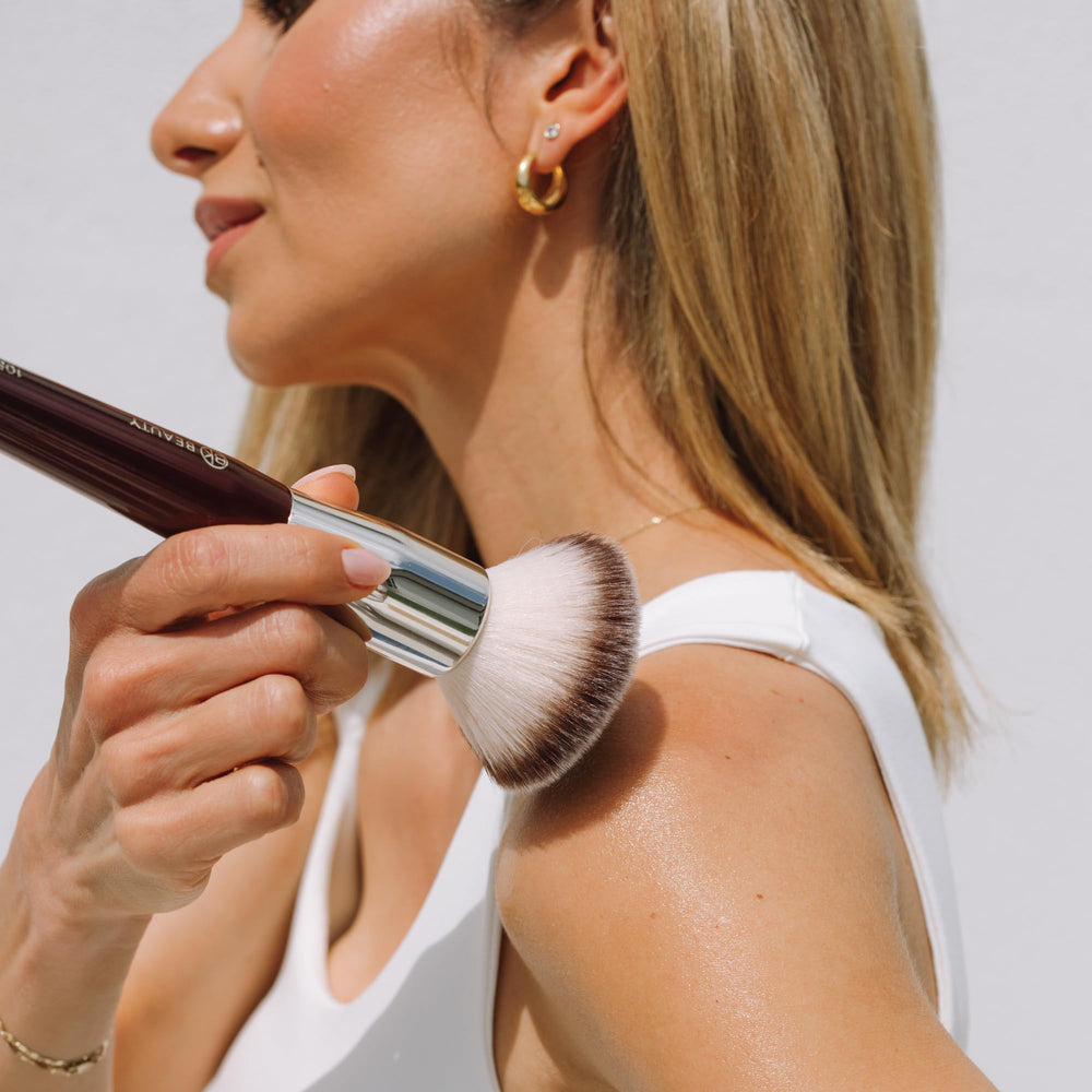BK BEAUTY multi-use brushes shown with bronzer, blush, and powder