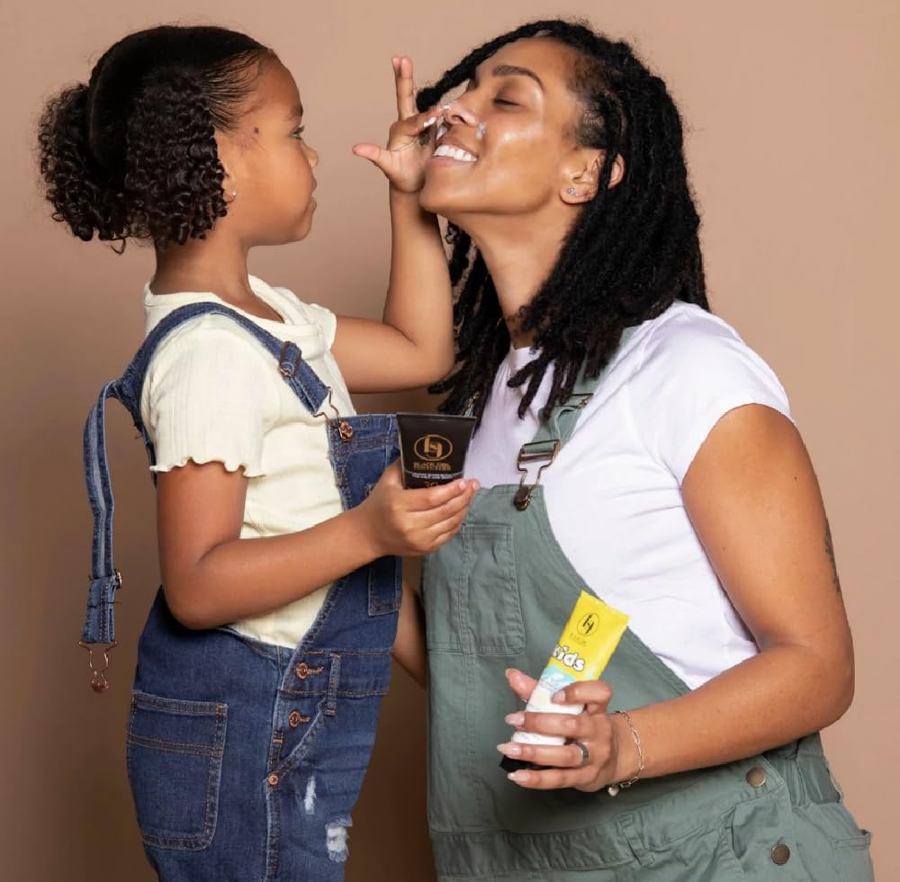 BLACK GIRL SUNSCREEN water-resistance label indicating 80-minute protection.