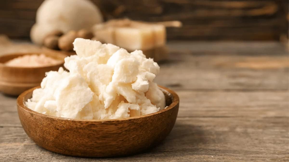 Bless International mango butter texture close-up shows smooth, blendable base for balms.