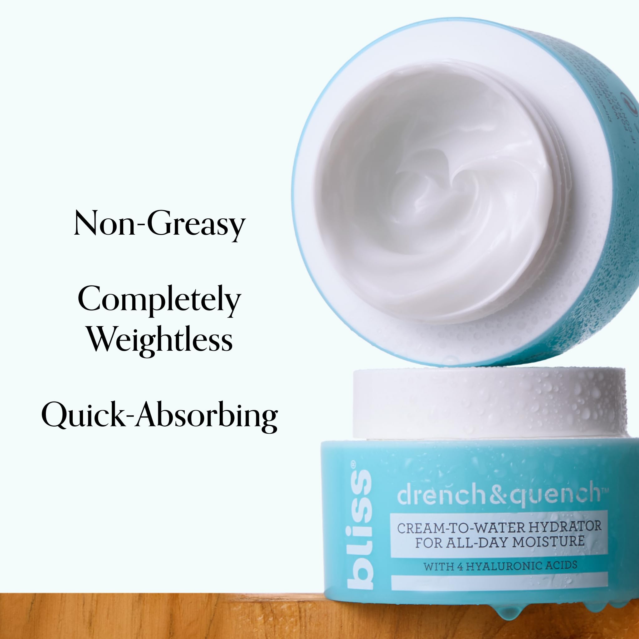 Bliss Drench & Quench skin absorption image emphasizes non-greasy hydration.