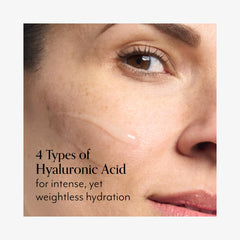Bliss Hyaluronic Acid Drench & Quench serum application on skin for hydration.