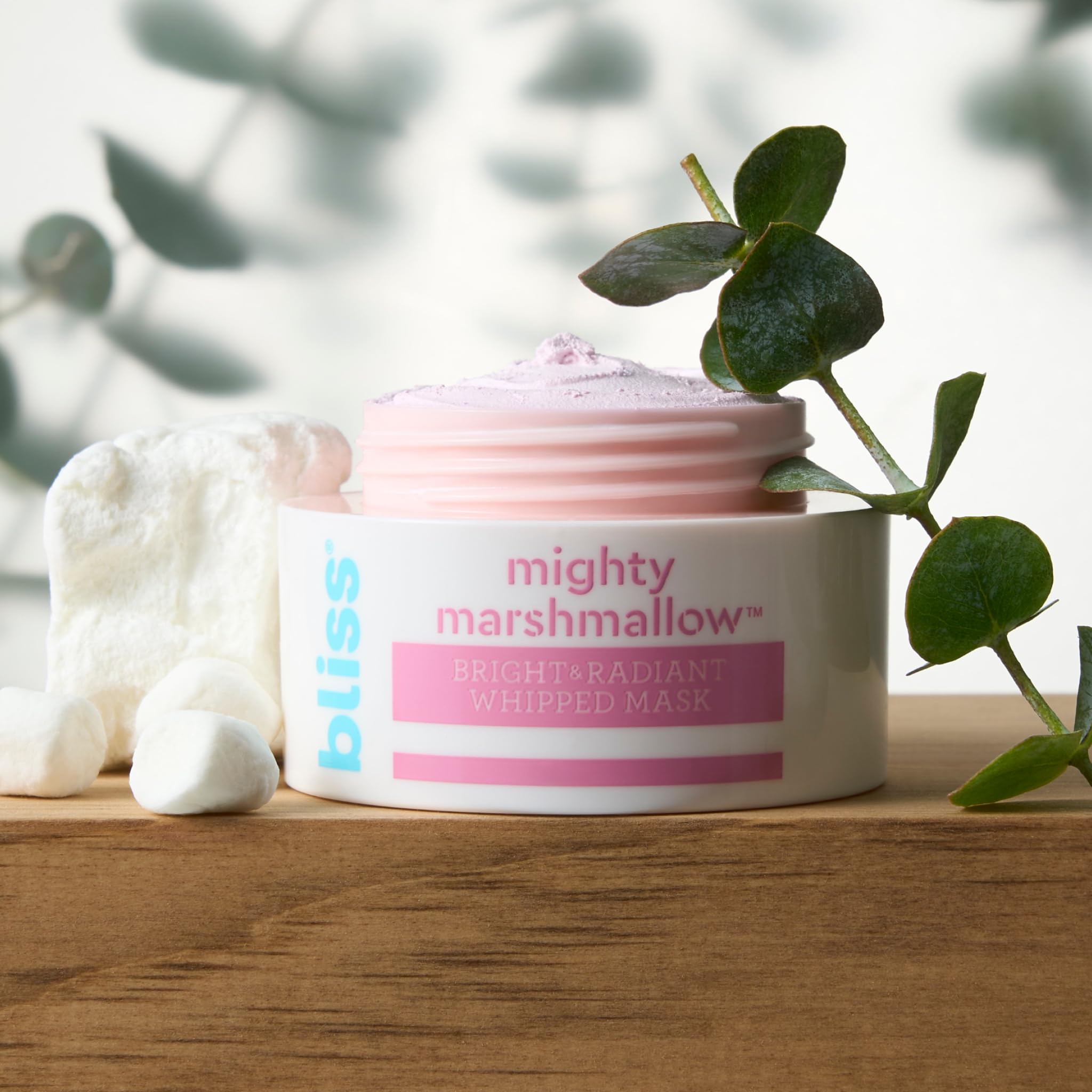 Bliss Mighty Marshmallow Mask applying thick layer on clean skin for a radiant glow.