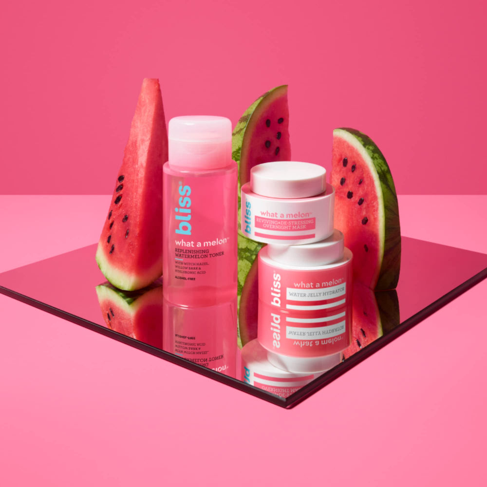 Applying Bliss What a Melon toner with cotton pad after cleansing