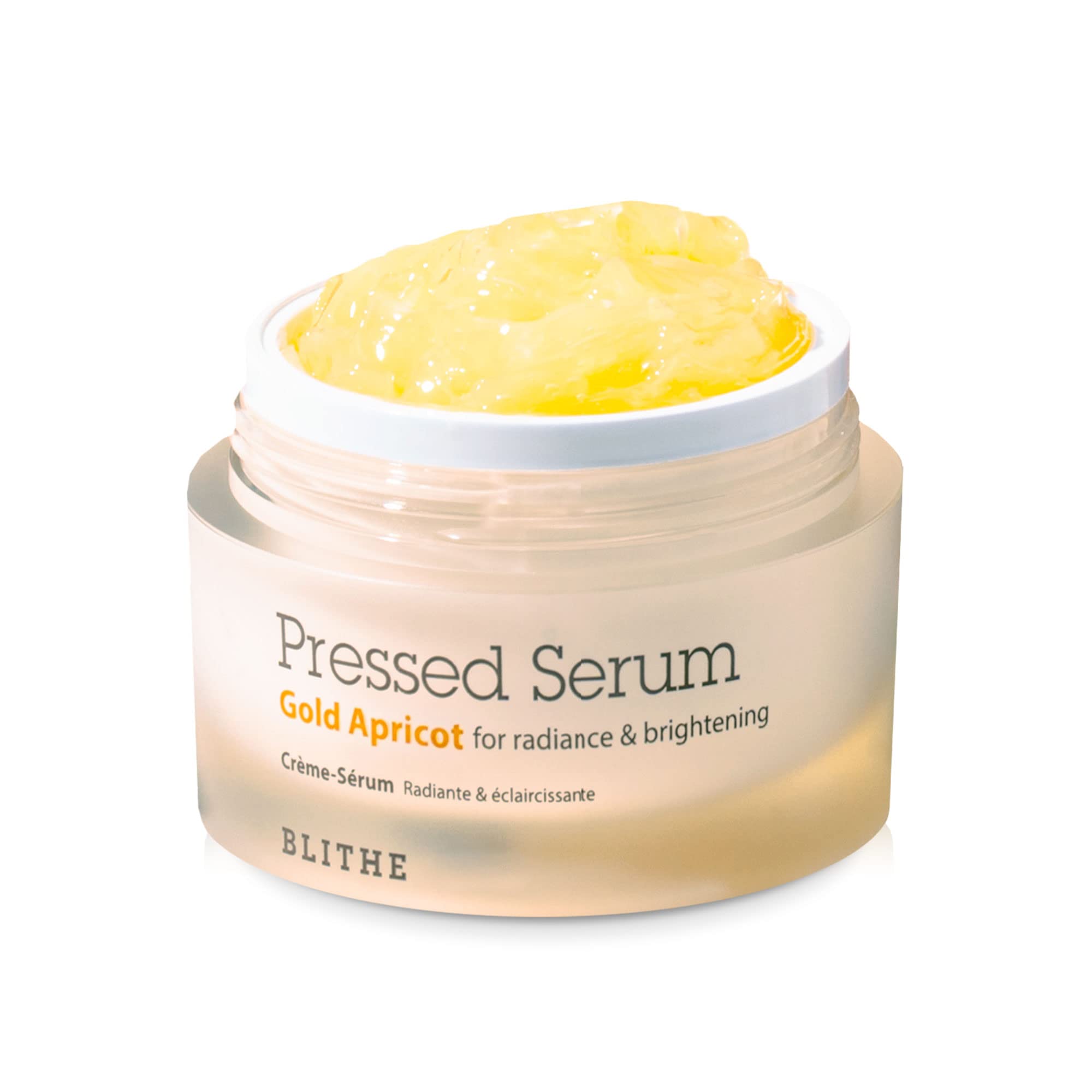 BLITHE Pressed Serum Gold Apricot bottle close-up highlights glow-boosting Niacinamide.