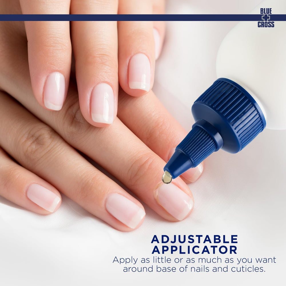 Blue Cross cuticle remover bottle on dresser for salon-quality nail care at home.