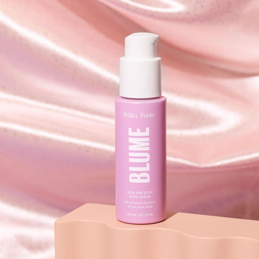 Dropper close-up releasing Milky Fade for improved skin tone.