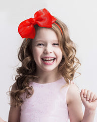 Bnikion lace bow headband front view highlighting delicate detailing