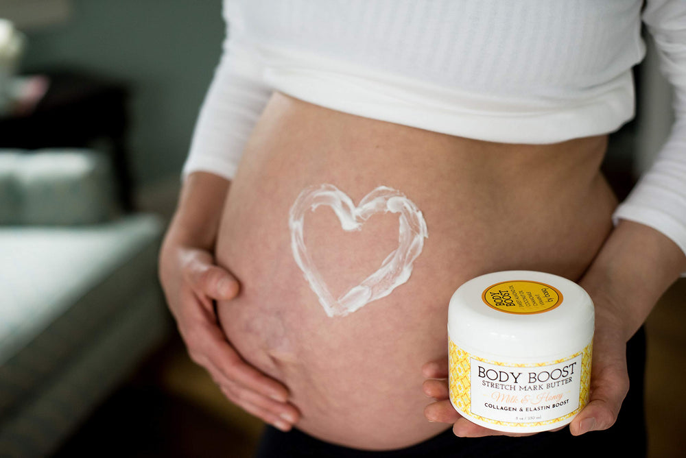 Body Boost Milk & Honey Stretch Mark Butter jar close-up, ideal for nourishing postpartum skin.