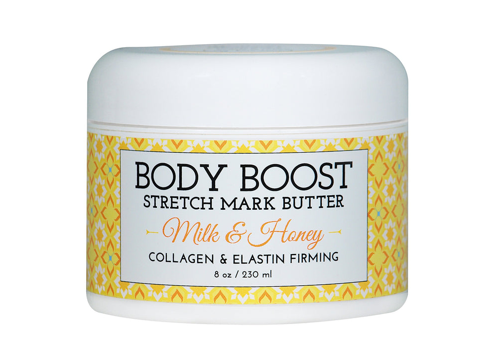 Body Boost Milk & Honey Stretch Mark Butter packaging close-up highlighting a nourishing formula for resilient skin.