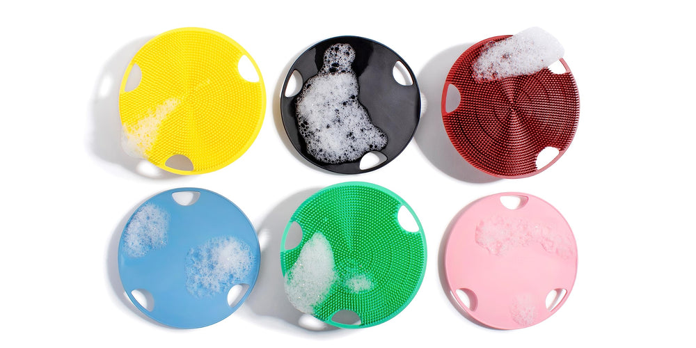 Boie USA Flat Body Scrubber pink travel-ready compact size for gym showers.