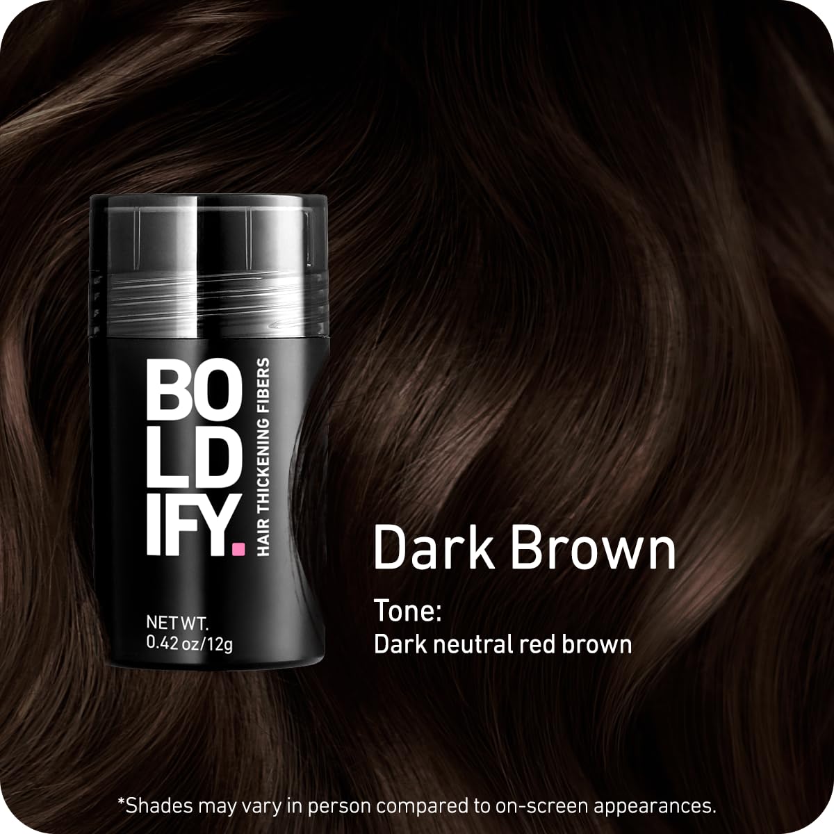 Boldify Hair Fibers bottle dispensing fibers onto thinning crown.