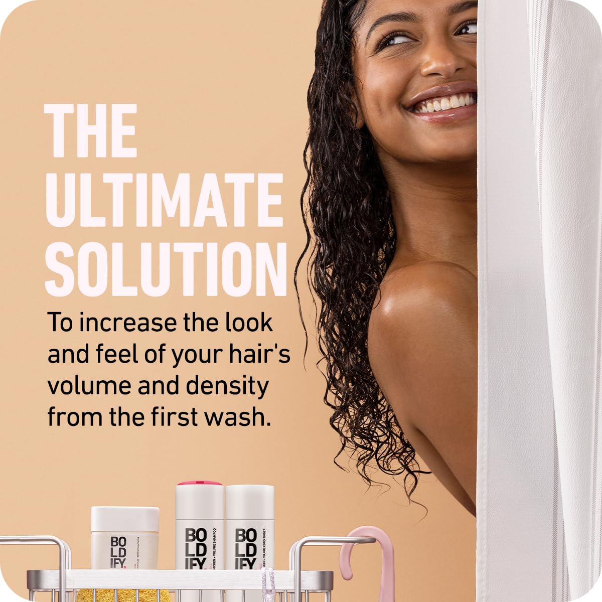 Boldify Thicken Volume Conditioner being applied to hair for detangling ease