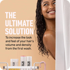 Boldify Thicken Volume Conditioner being applied to hair for detangling ease