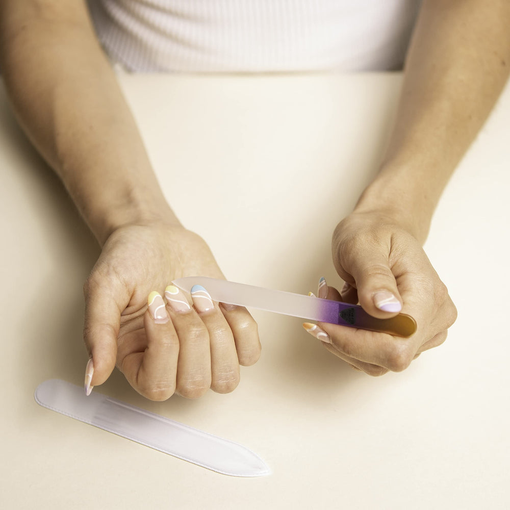 Bona Fide Beauty crystal glass nail file closeup showing gentle smoothing.