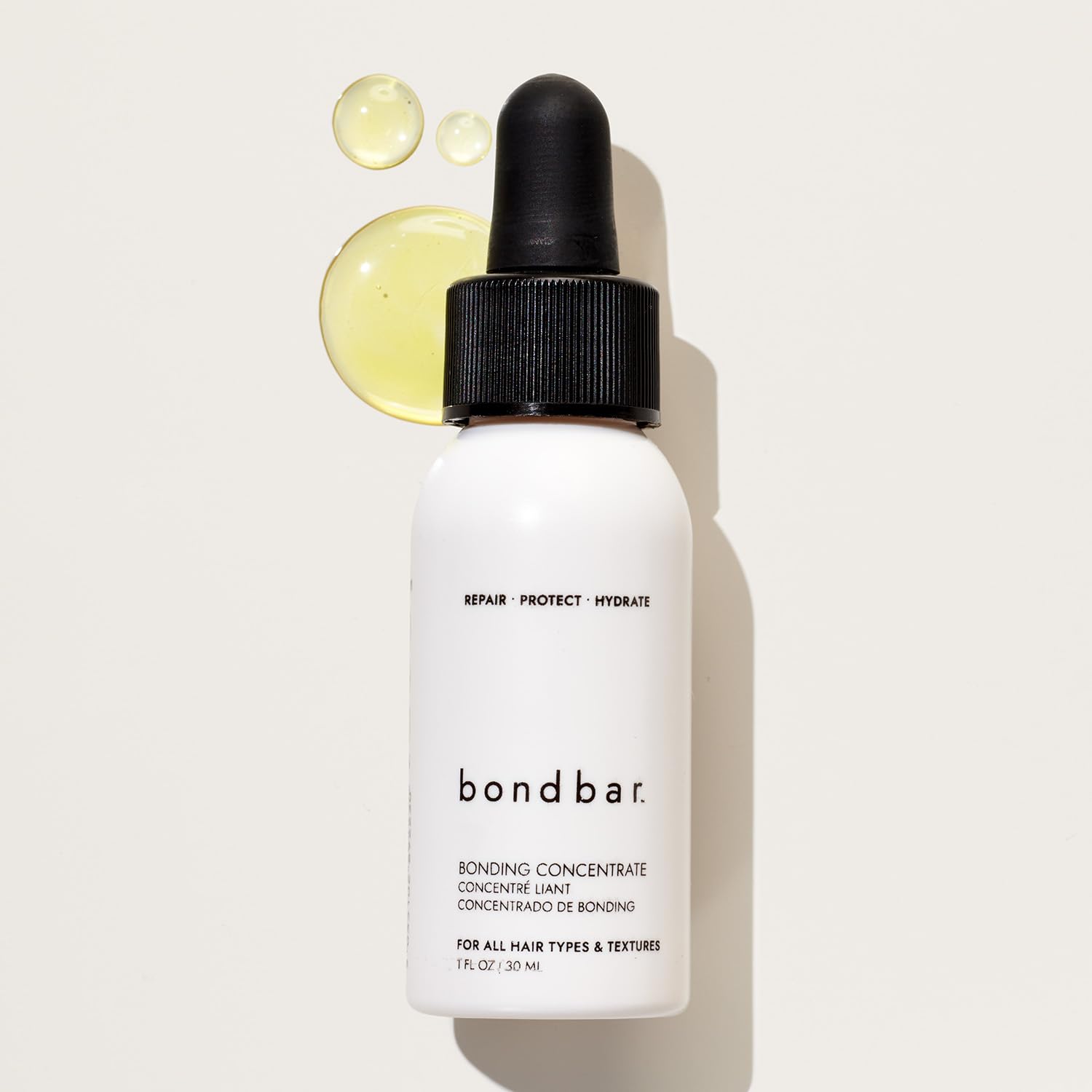 Bondbar Bonding Concentrate bottle emphasizes vegan cruelty-free formulation.