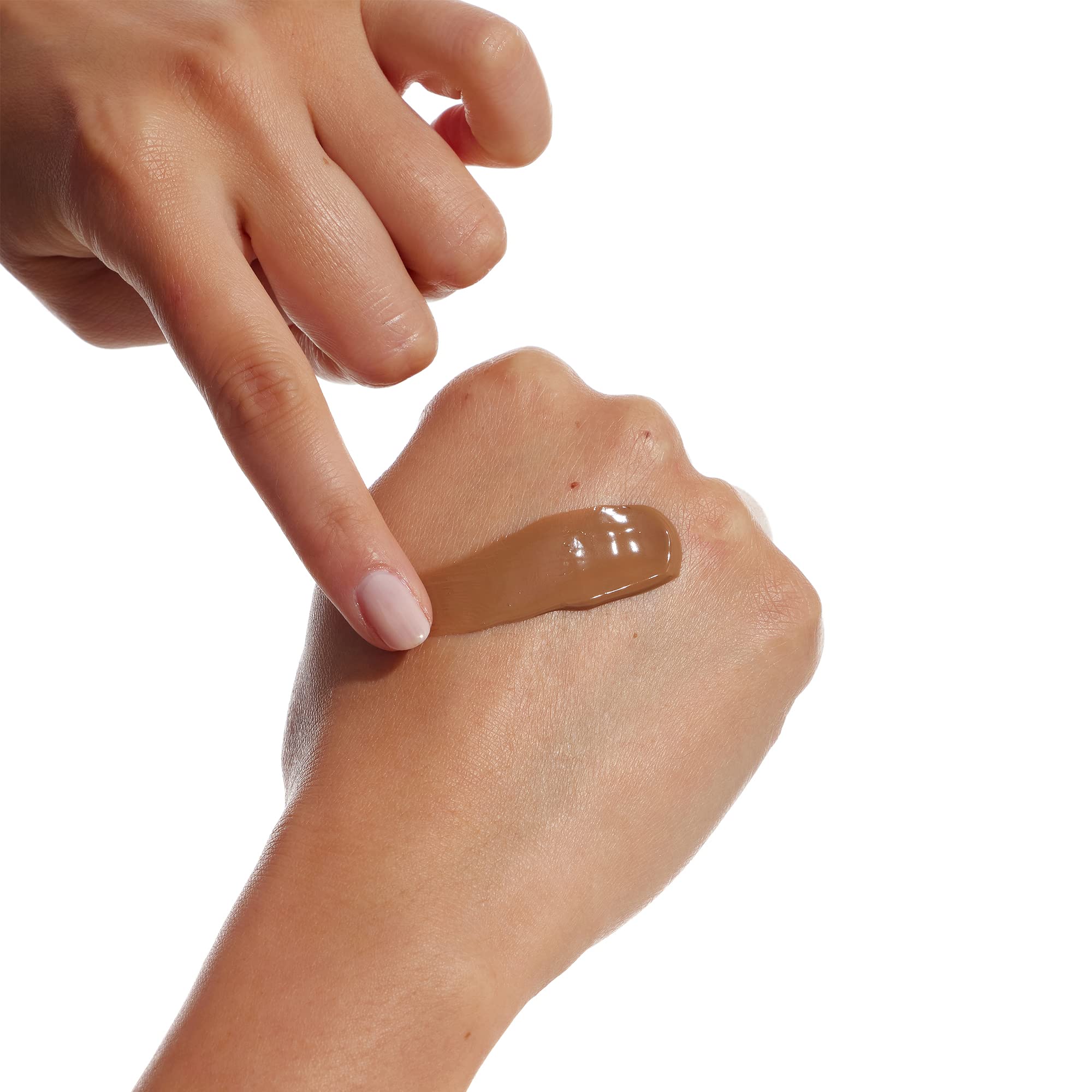 Bondi Sands gradual tanning lotion arm application shows seamless color on skin.