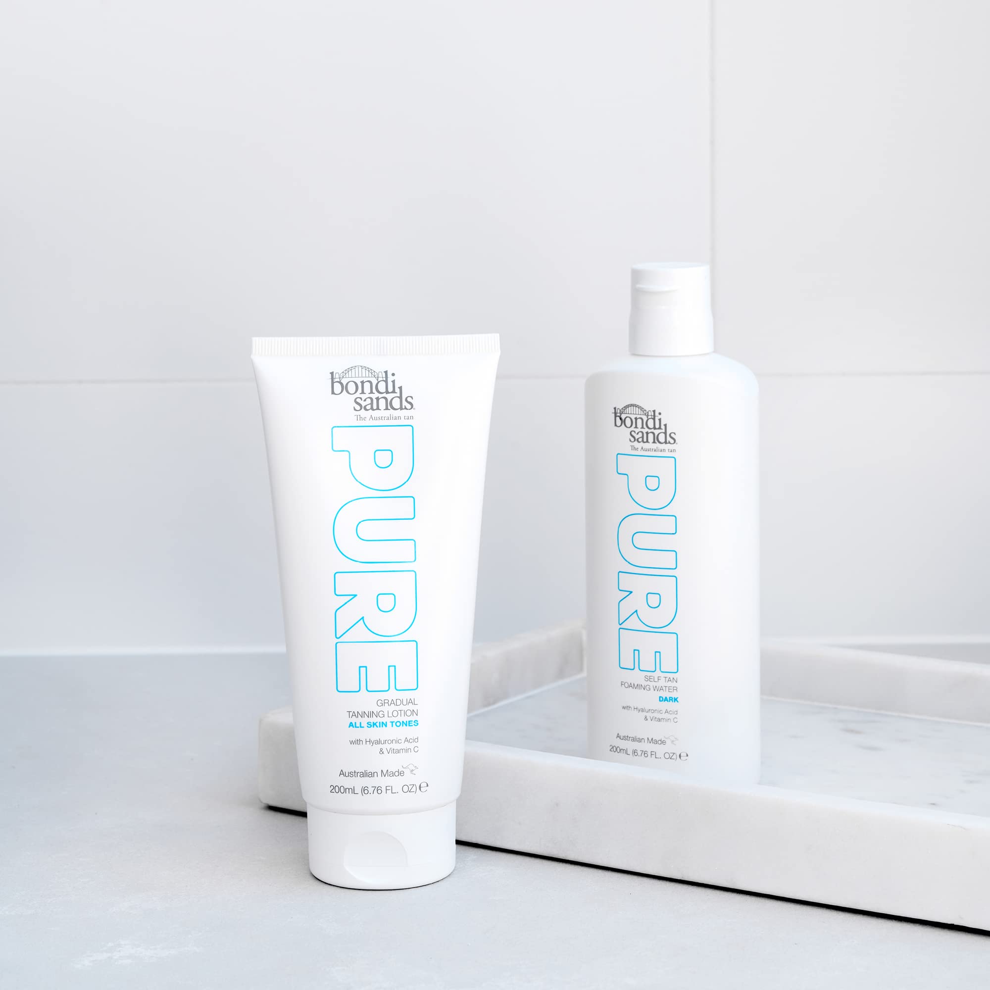 Bondi Sands PURE lotion close-up highlights hyaluronic acid for hydrated skin.