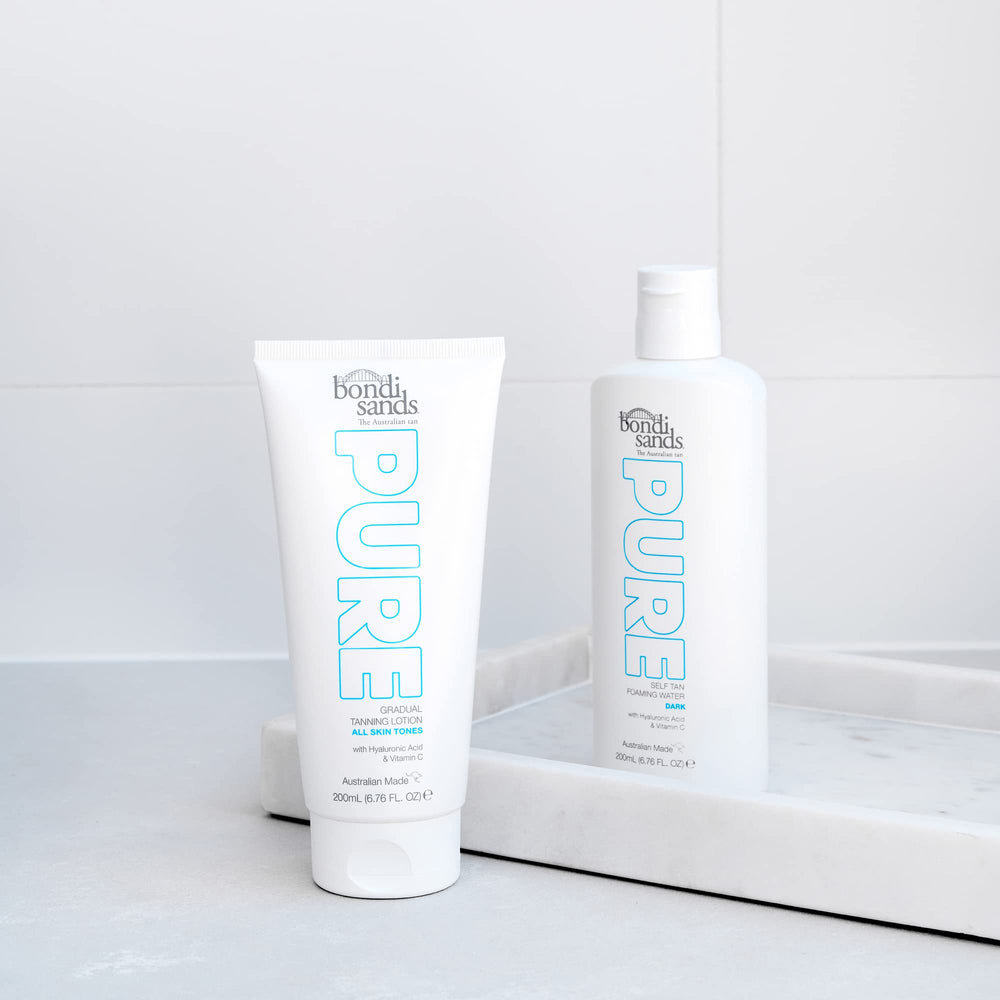 Bondi Sands PURE lotion close-up highlights hyaluronic acid for hydrated skin.