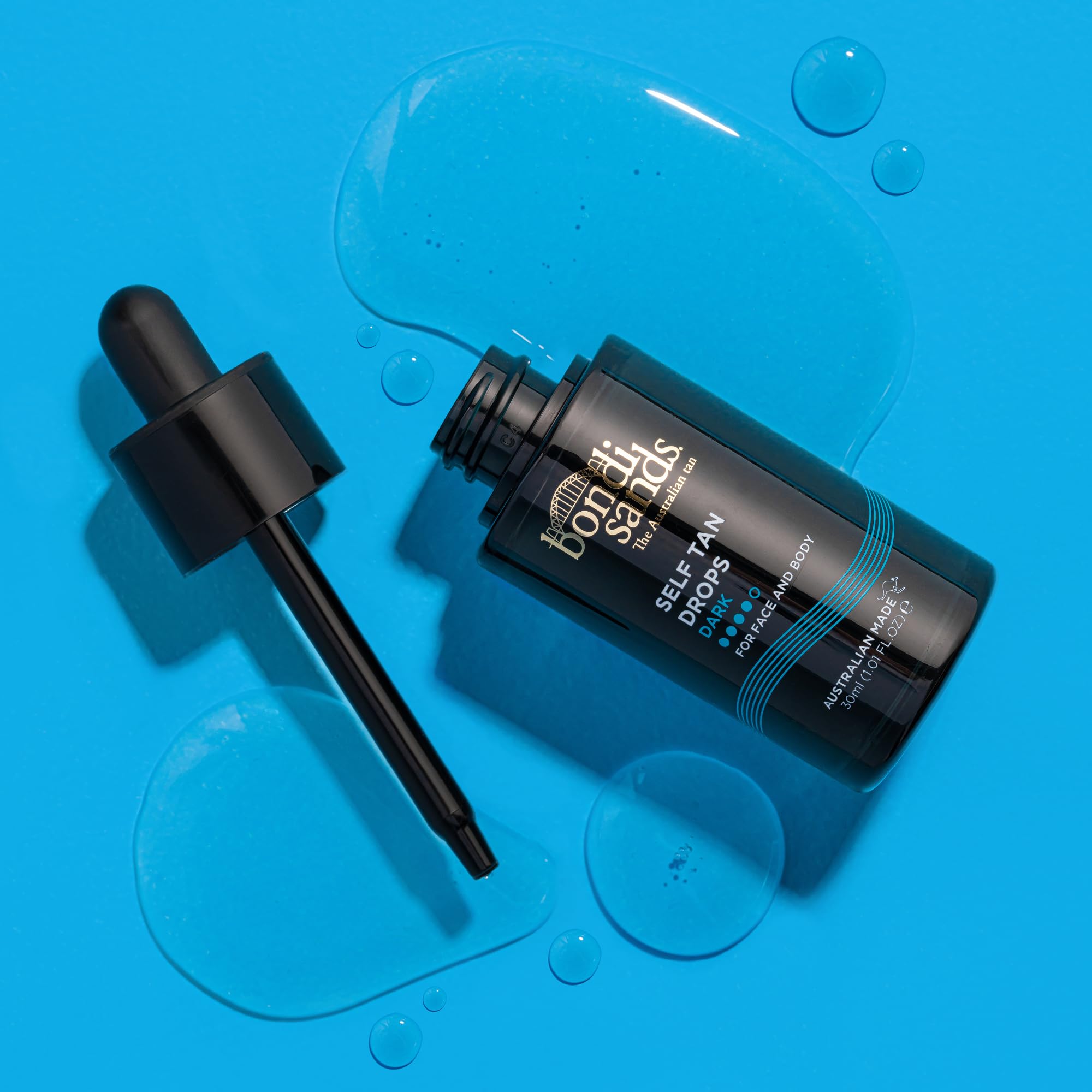 Bondi Sands Self Tan Drops mixed with moisturizer for a personalized tint.