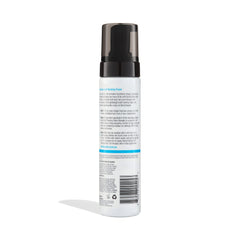 Foam is dispensed from the Bondi Sands bottle for even coating.