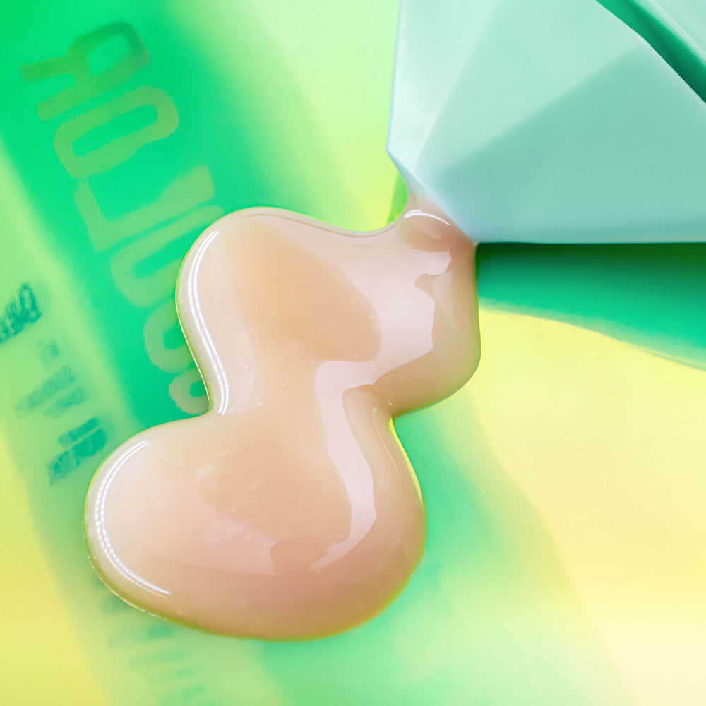 Bondi Sands Technocolor Face Serum texture close-up highlighting smooth finish.