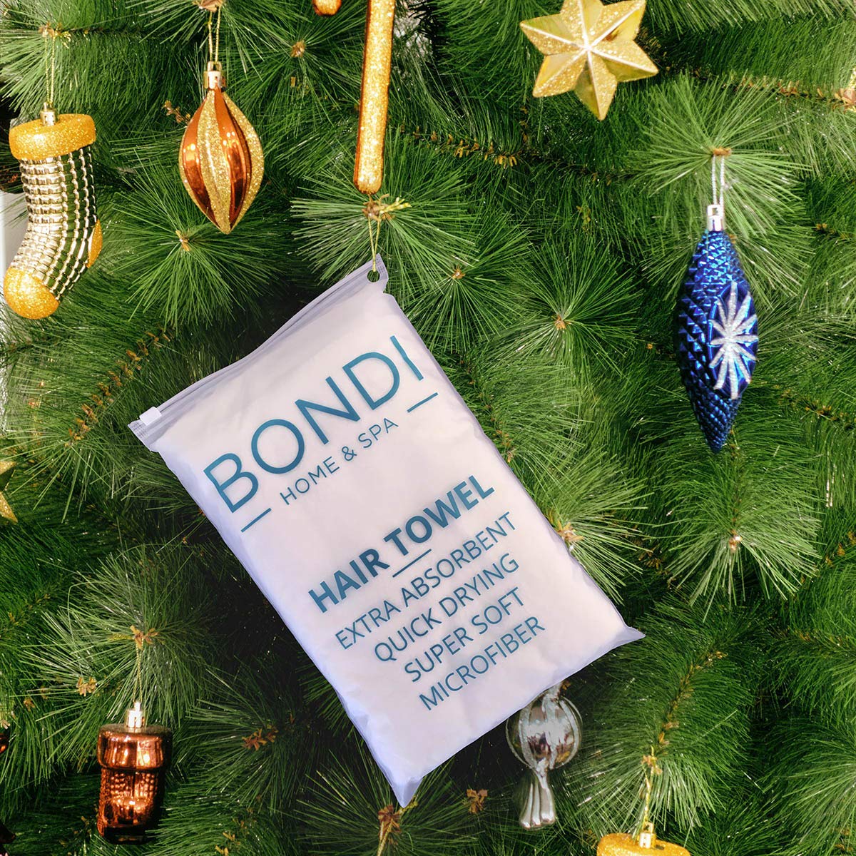Bondi Spa hair towel stretched over hair shows super absorbent performance.