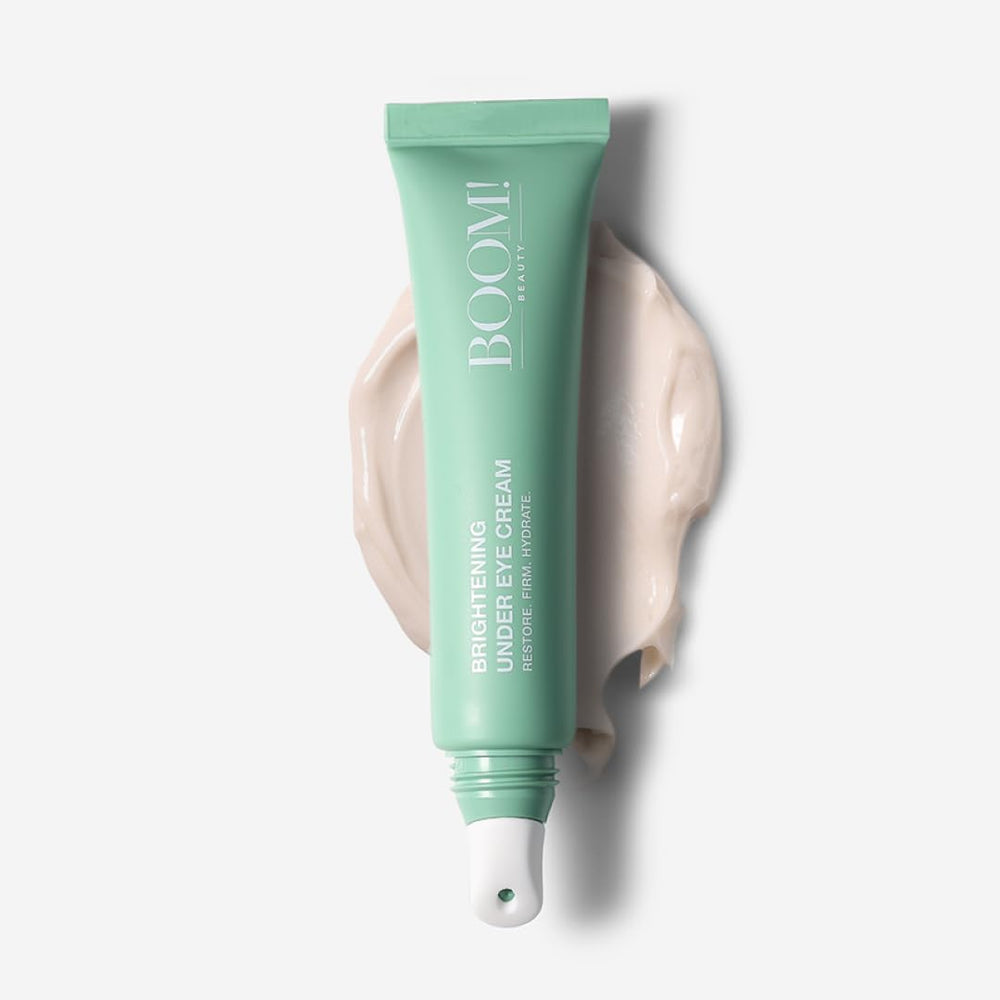 BOOM! by Cindy Joseph Boom Awaken under-eye cream tube close-up showing cooling formula for refreshed eyes.