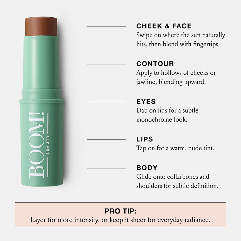 BOOM! BoomStick Bronze applied to collarbone for radiant sun-kissed glow.